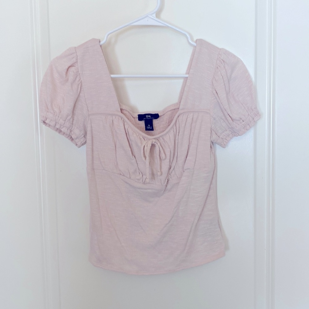 Pink v neck top.